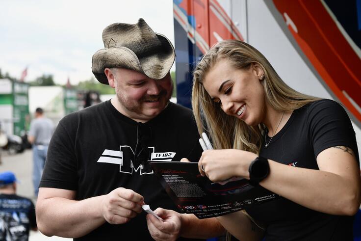 Ida Zetterström autographs with fans at 2025 NHRA New England Nationals