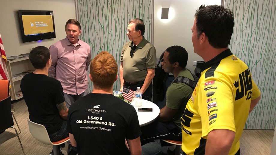 NHRA President Glen Cromwell, NHRA's John Siragusa, and former Pro Stock champ Jeg Coughlin Jr. visited with military personnel