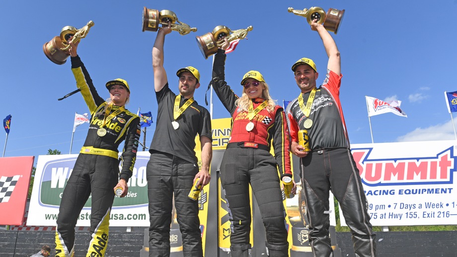 The winners of the NHRA Southern Nationals Powered by Mello Yello hold their Wallys