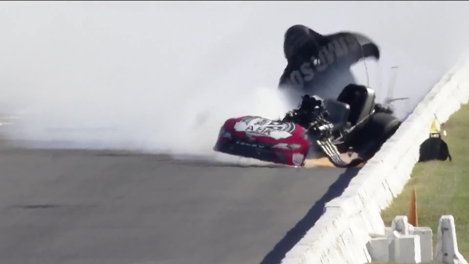Alexis DeJoria walks away after Funny Car crash at Midwest Nationals