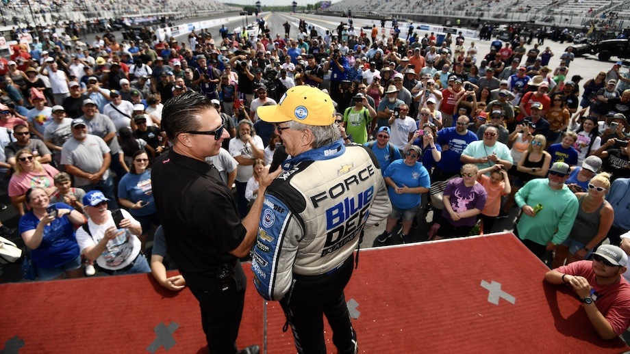 Why has John Force excelled at four-wide racing? 