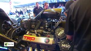 Encyclospeedia: The DHL Funny Car team thrashes in between rounds