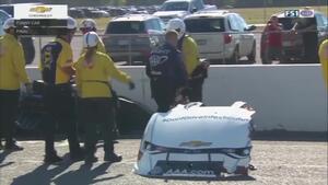 Co-crew chief Chris Cunningham diagnoses Robert Hight&#039;s Funny Car