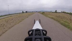 NHRA&#039;s Amanda Busick makes a pass in a dragster at the Frank Hawley School of Drag Racing.